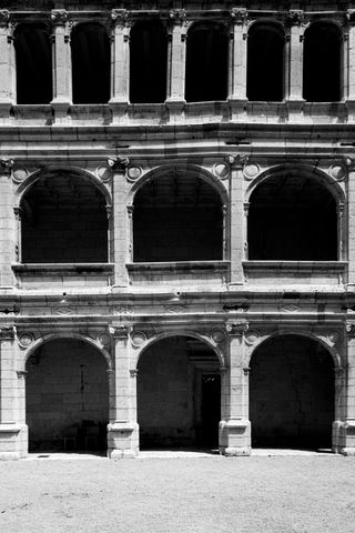 Old mansion's facade with multiple arches