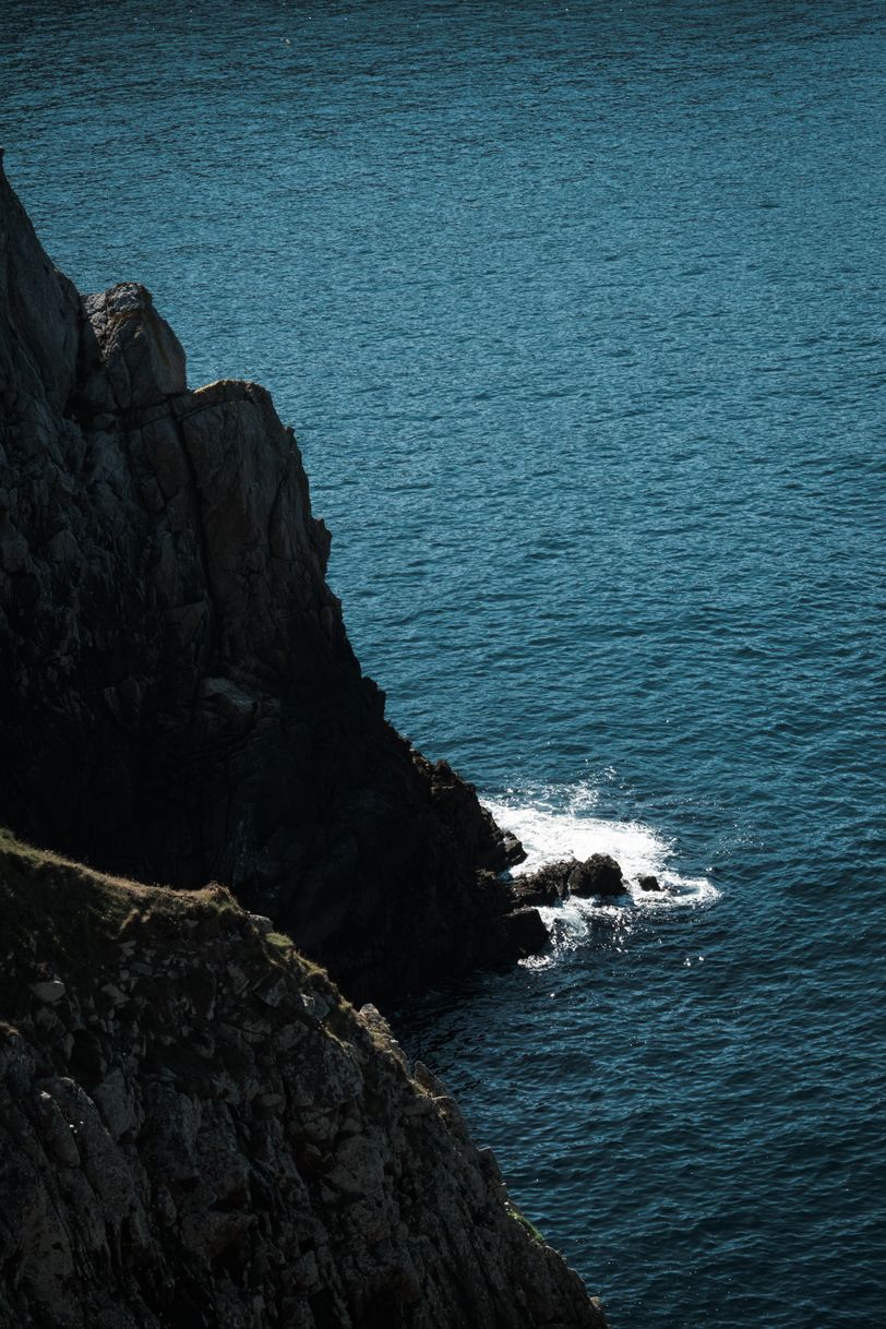 Sharp cliff and sea meeting