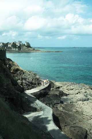 Coastline with a path walked by a few people