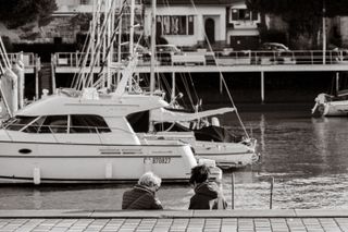 Two people emerging from a canal
