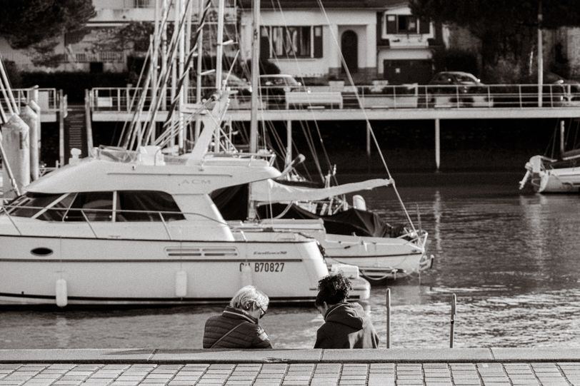 Two people emerging from a canal