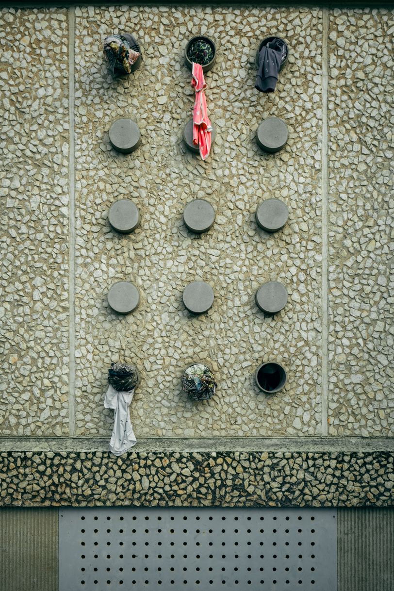 Holes in a wall, all stuffed but one