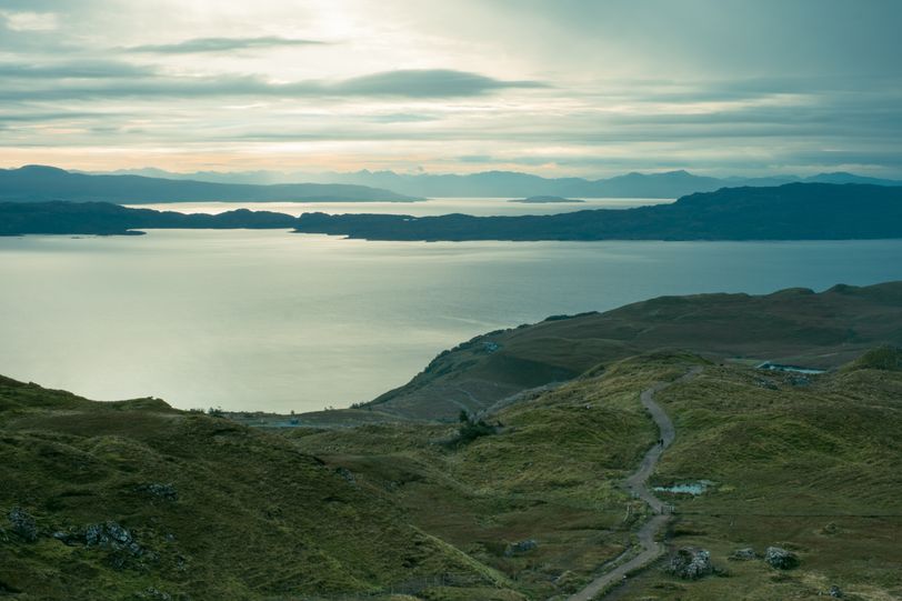 Landscape of scottish lochs on a rising sun