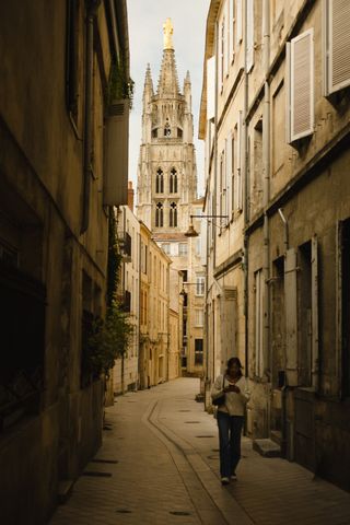 Small pedestrian alley leading to a church