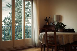 Interior of an apartment, a living room next to a window