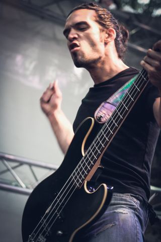 Black Strobe's bassist on stage