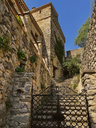 A staircase to a house built within a medieval tower