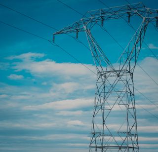 Electric pole on a blue sky