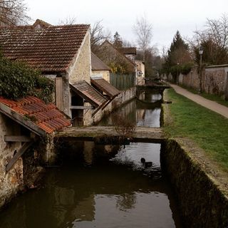 A village with a stream of water going through