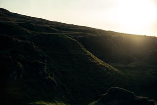 Setting sun on a hill