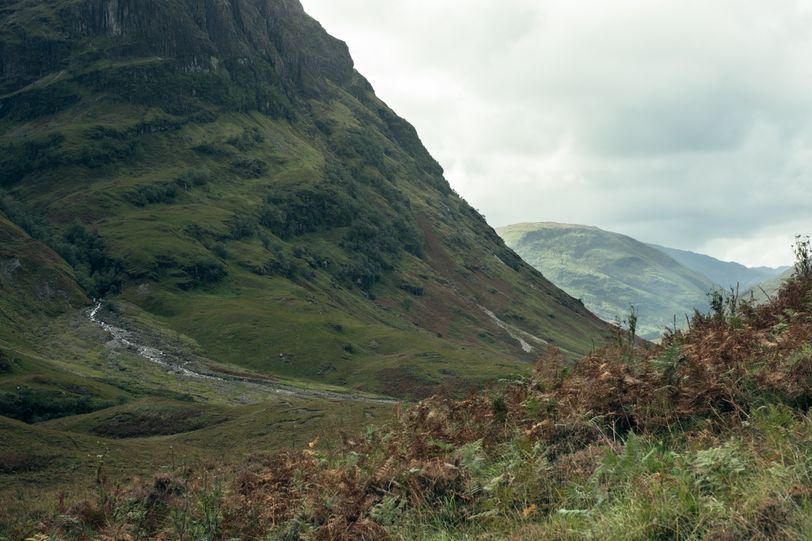 Landscape of the Highlands in Scotland with two massive mountains