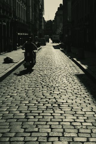 Paved street, in the morning, with a strong morning light