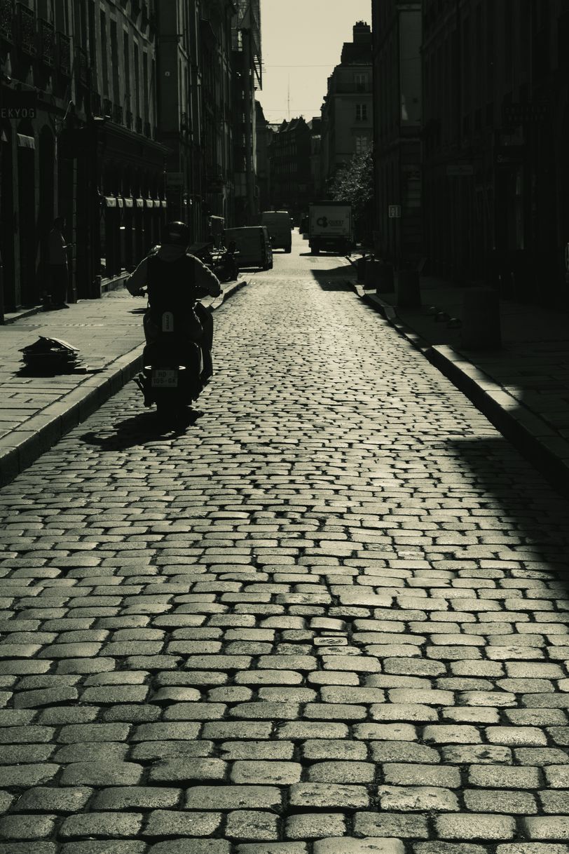 Paved street, in the morning, with a strong morning light