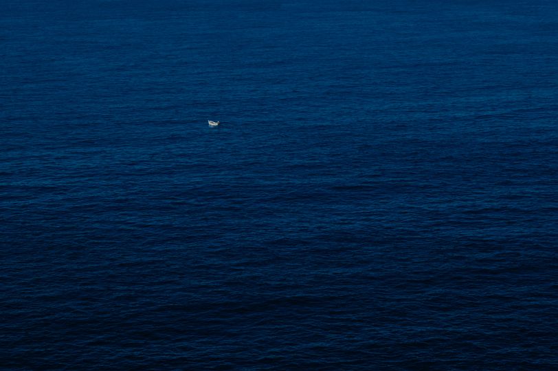 A small lonely boat in the sea
