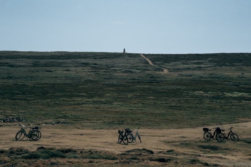 A few bicycles down a hill