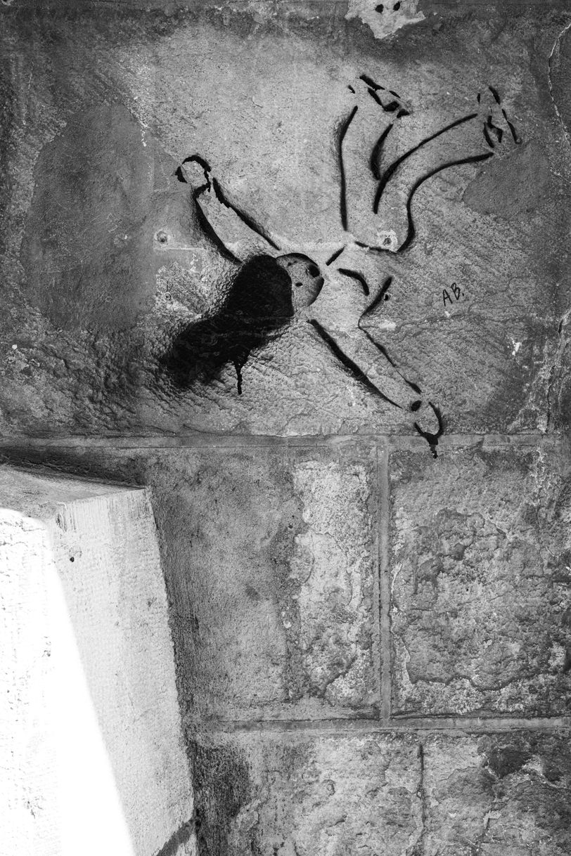 Drawing on a wall of a person falling