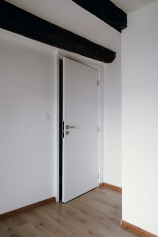 A room's half open door