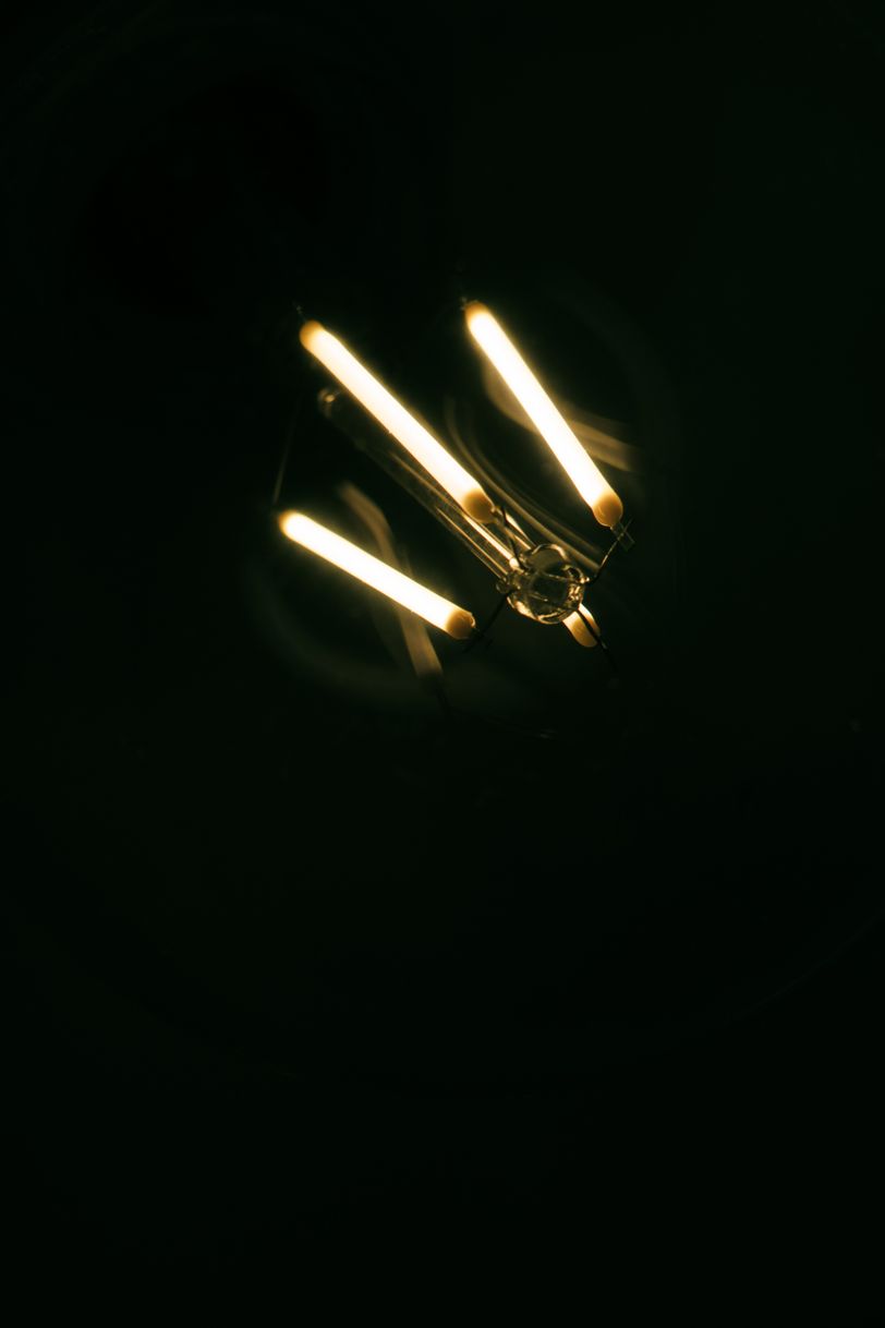 Light bulb barely emitting light in the dark