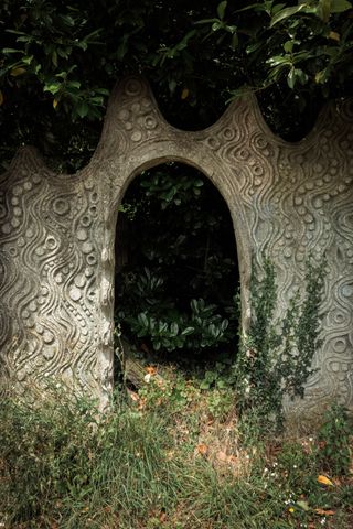 Engraved stone arch in the wild