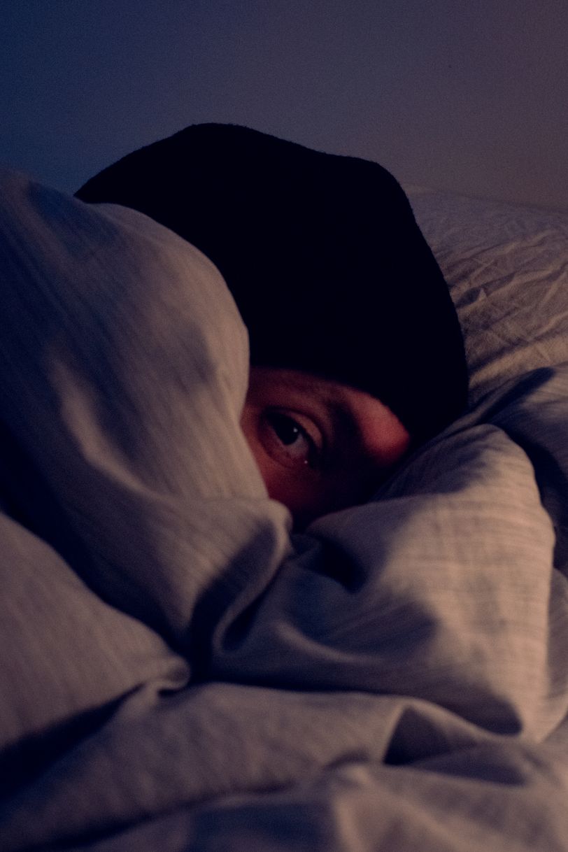 Myself bundled up in my bed while resting from my cold