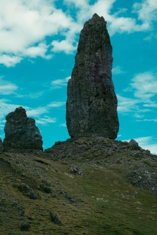 Pointy rock on top of a hill