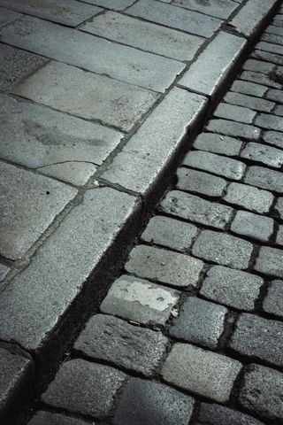 Gutter of a paved road and sidewalk