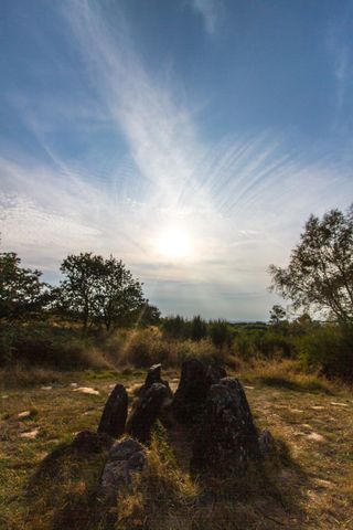 Stones arranged as a mini house without roof