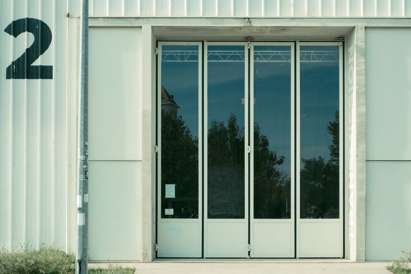 Front of a warehouse with the number 2