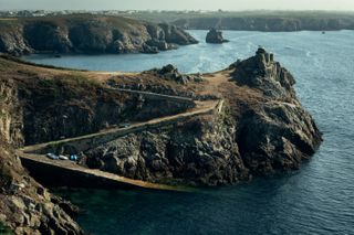 Shores with a zigzag road from the hill to the sea